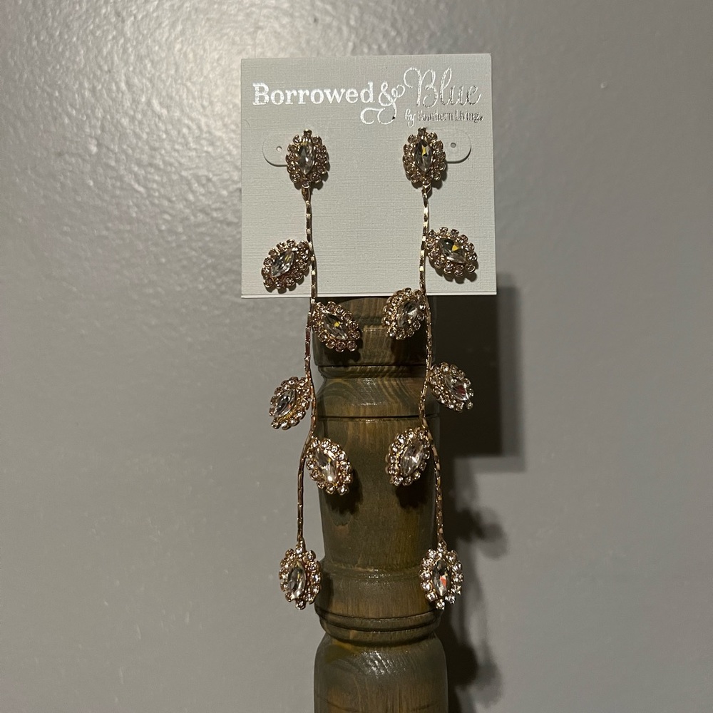 Long gold earrings!